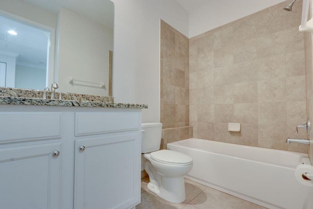 full bathroom featuring toilet, vanity, crown molding, tiled shower / bath, and tile flooring