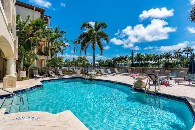 view of pool featuring a patio area