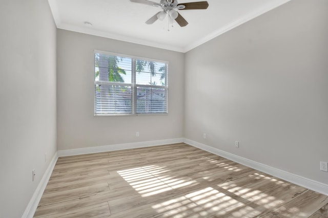 unfurnished room with light hardwood / wood-style flooring, ceiling fan, and crown molding