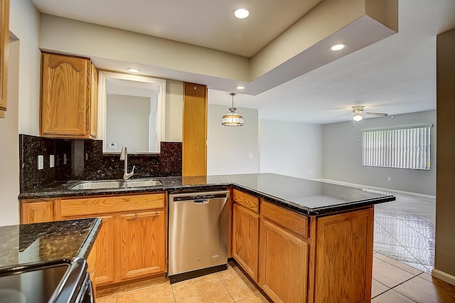 kitchen with kitchen peninsula, ceiling fan, sink, dishwasher, and tasteful backsplash