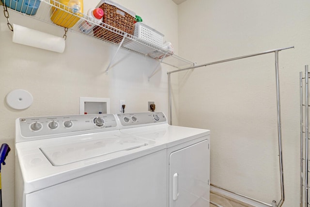 washroom featuring washer and dryer, electric dryer hookup, and washer hookup