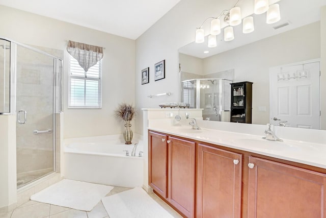 bathroom featuring independent shower and bath, tile flooring, dual sinks, and large vanity