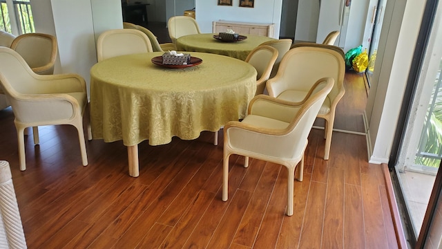 dining room with hardwood / wood-style flooring