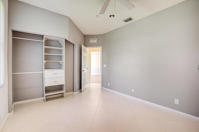 unfurnished bedroom with a closet, ceiling fan, and light tile flooring