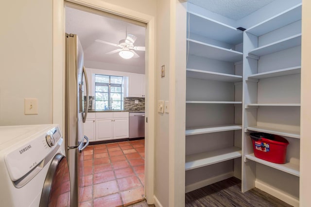 pantry featuring washer / clothes dryer