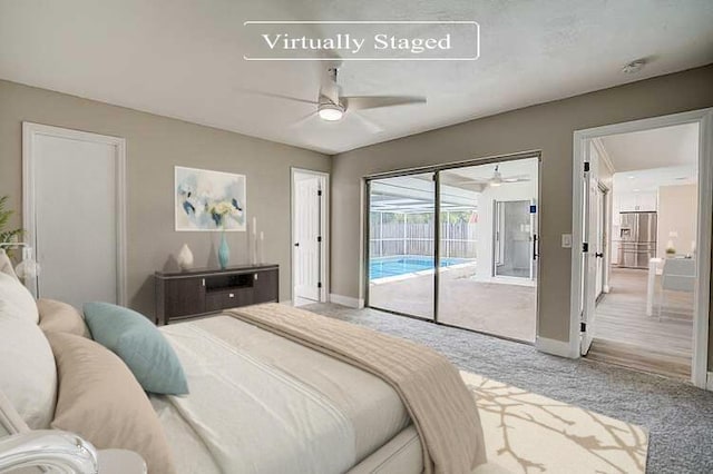 carpeted bedroom featuring stainless steel fridge, access to exterior, and ceiling fan