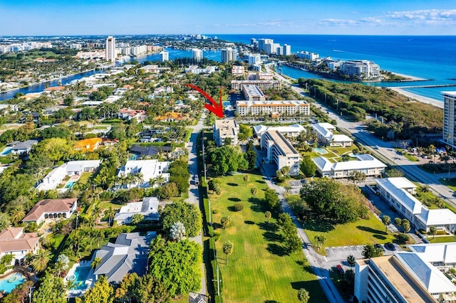 birds eye view of property featuring a water view