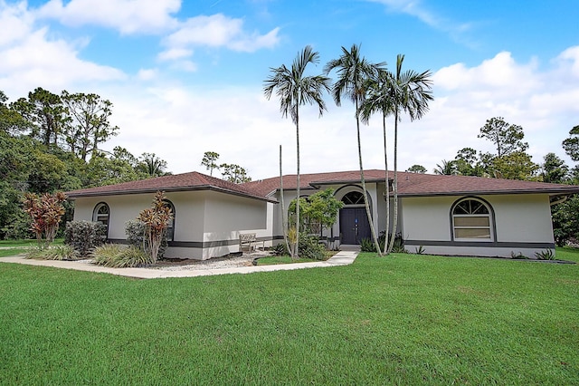 view of front of home with a front yard