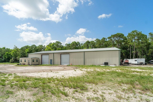 view of shed / structure featuring a garage