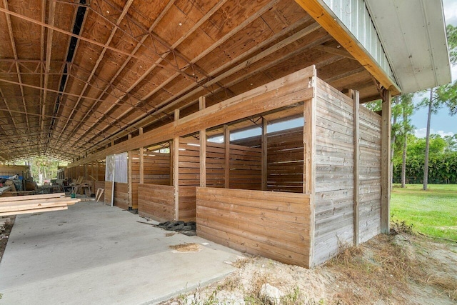 view of horse barn featuring an outdoor structure