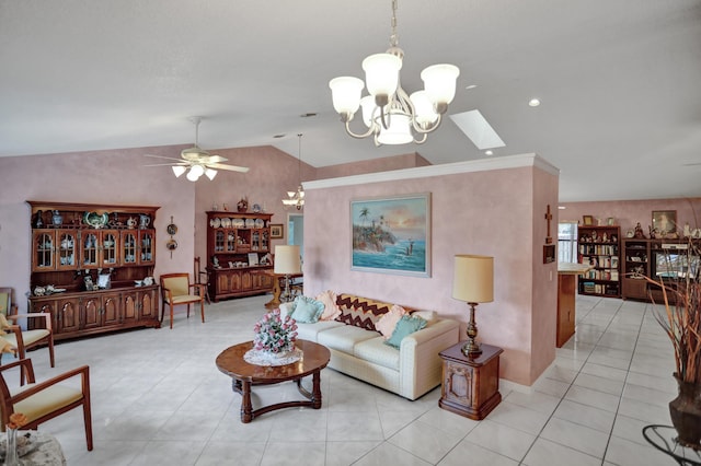 living room with vaulted ceiling with skylight, ceiling fan with notable chandelier, and light tile flooring