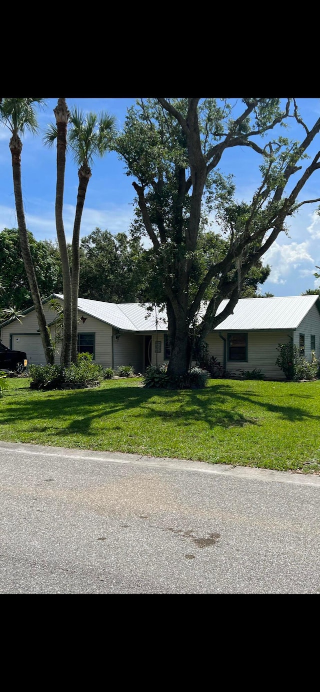 view of front of home with a front yard