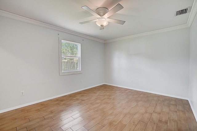unfurnished room featuring ornamental molding, ceiling fan, and light hardwood / wood-style flooring