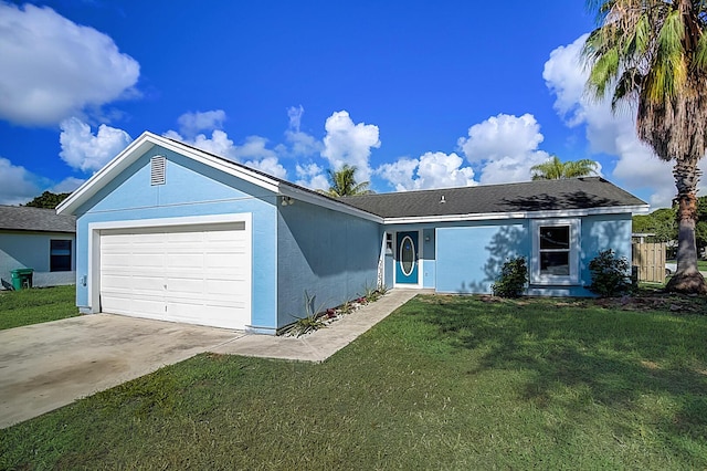 ranch-style home with a front lawn and a garage