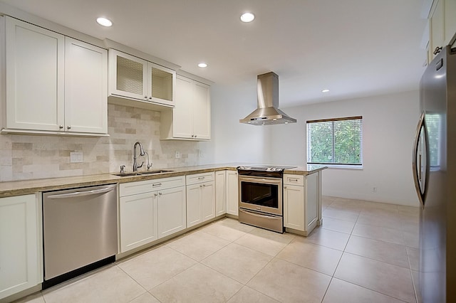 kitchen featuring white cabinetry, kitchen peninsula, appliances with stainless steel finishes, and island exhaust hood