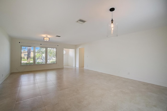 view of tiled spare room