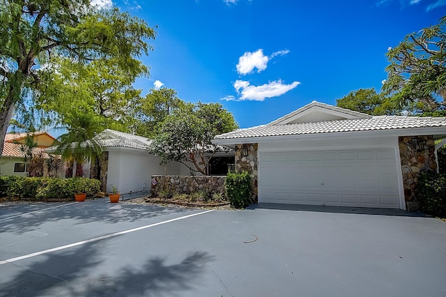 view of front of property with a garage