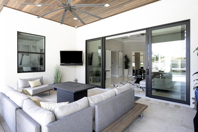 view of patio / terrace with ceiling fan and an outdoor hangout area