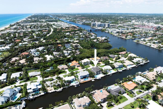 drone / aerial view featuring a water view