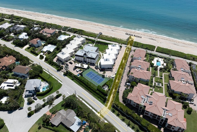 aerial view featuring a view of the beach and a water view