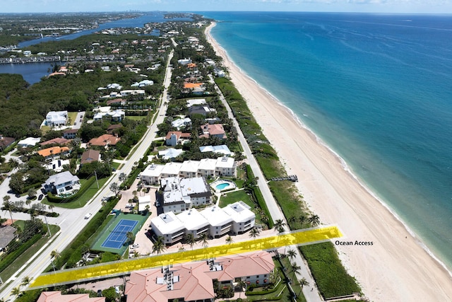 aerial view with a view of the beach and a water view