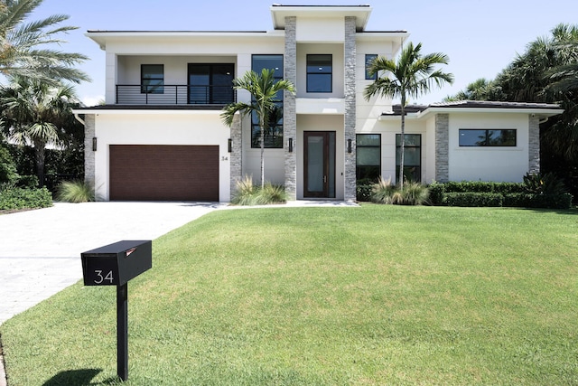 contemporary house with a front lawn and a garage