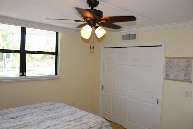 bedroom featuring a closet and ceiling fan