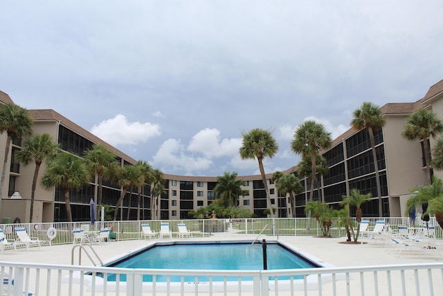 view of swimming pool with a patio area