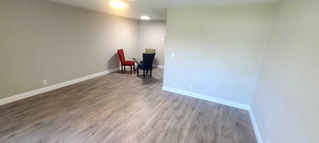 spare room with hardwood / wood-style floors