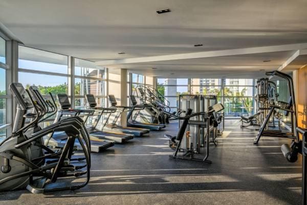 workout area with a wall of windows