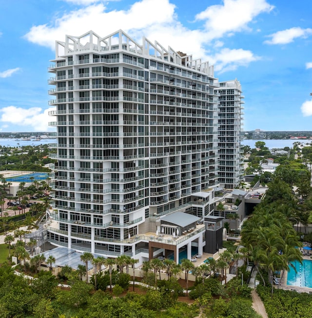 view of building exterior with a water view