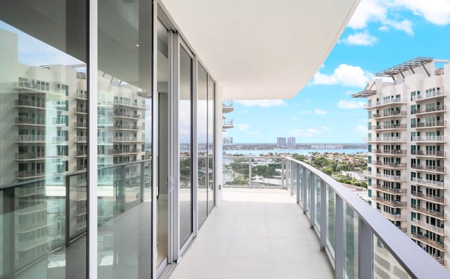 balcony featuring a water view