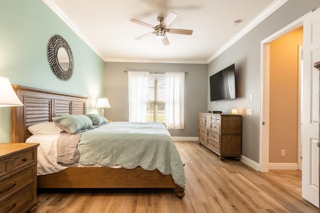 bedroom with ornamental molding, ceiling fan, and light hardwood / wood-style flooring