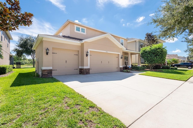 view of front of house featuring a front lawn and a garage