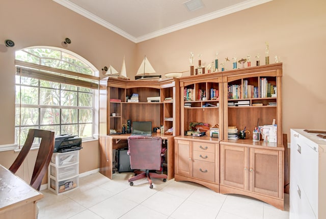 tiled office featuring crown molding and a healthy amount of sunlight