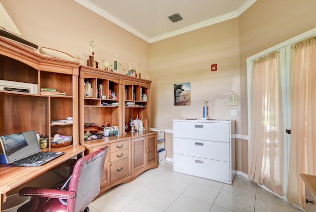 home office with light tile floors and ornamental molding