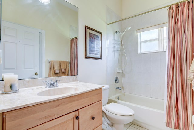 full bathroom featuring tile floors, oversized vanity, toilet, and shower / bathtub combination with curtain