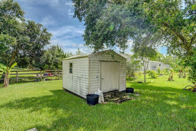 view of outdoor structure featuring a yard