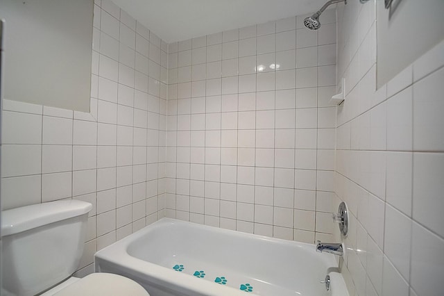 200 Waterway Dr S Unit 102, Lantana, FL 33462 - bathroom with tile walls, tiled shower / bath combo, and toilet
