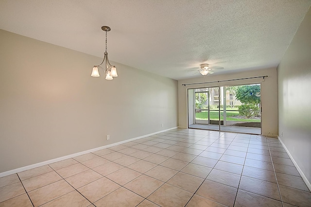 200 Waterway Dr S Unit 102, Lantana, FL 33462 - unfurnished room with a textured ceiling, ceiling fan with notable chandelier, and light tile floors