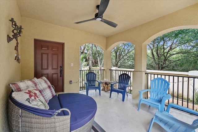 view of patio with ceiling fan