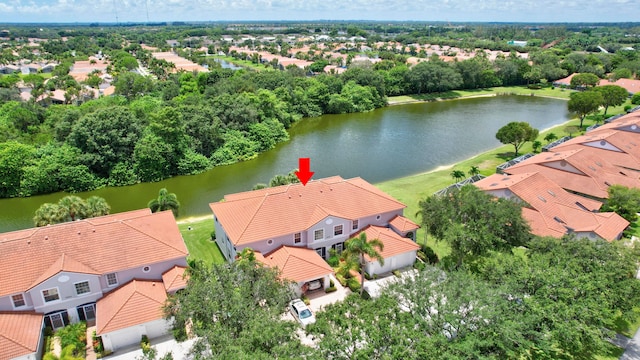 birds eye view of property featuring a water view