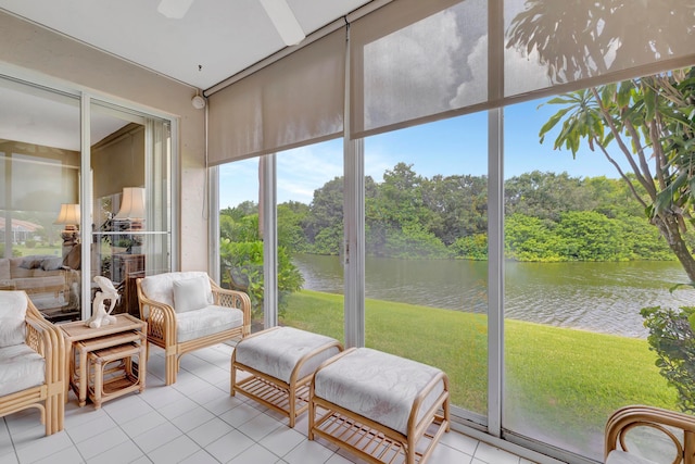 sunroom with a water view