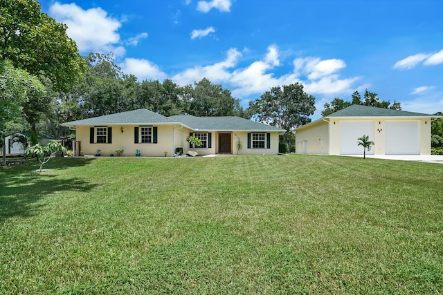 ranch-style home featuring a front yard and a garage