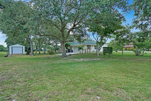 view of yard with a garage