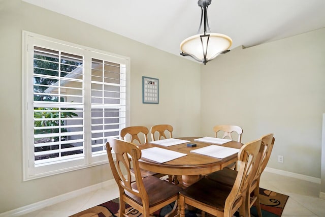 dining room with light tile floors