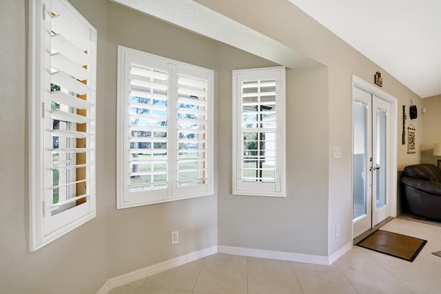 doorway featuring light tile flooring