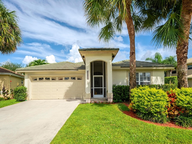 view of front facade with a front lawn and a garage