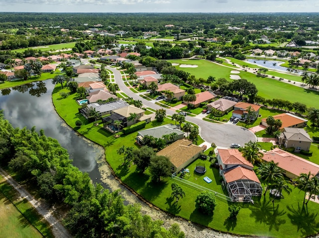 drone / aerial view with a water view