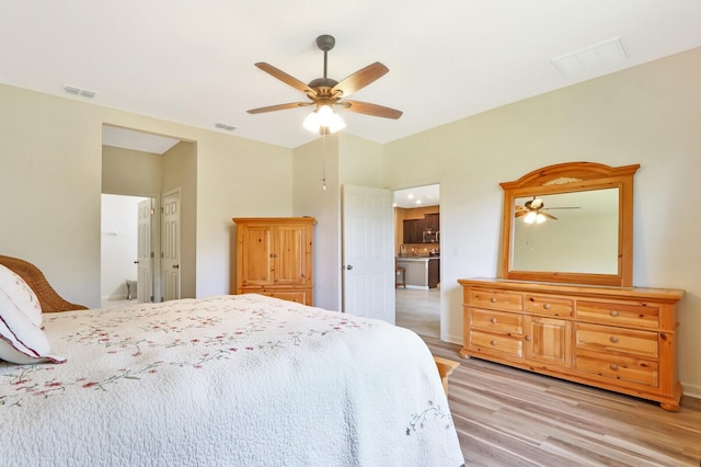 bedroom featuring ceiling fan and light wood-type flooring